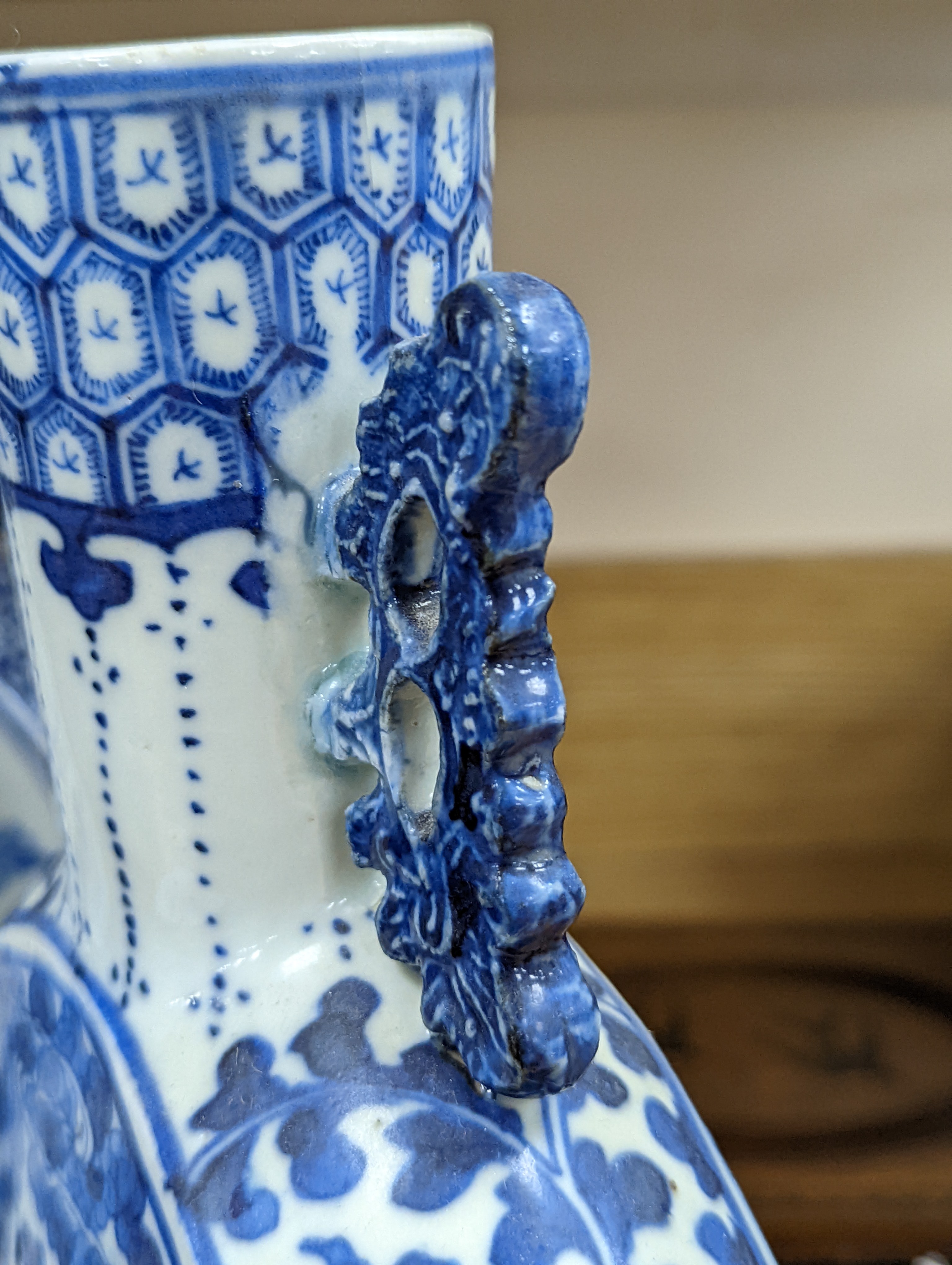 Three 19th century Chinese blue and white Moon flasks, tallest 31 cms.